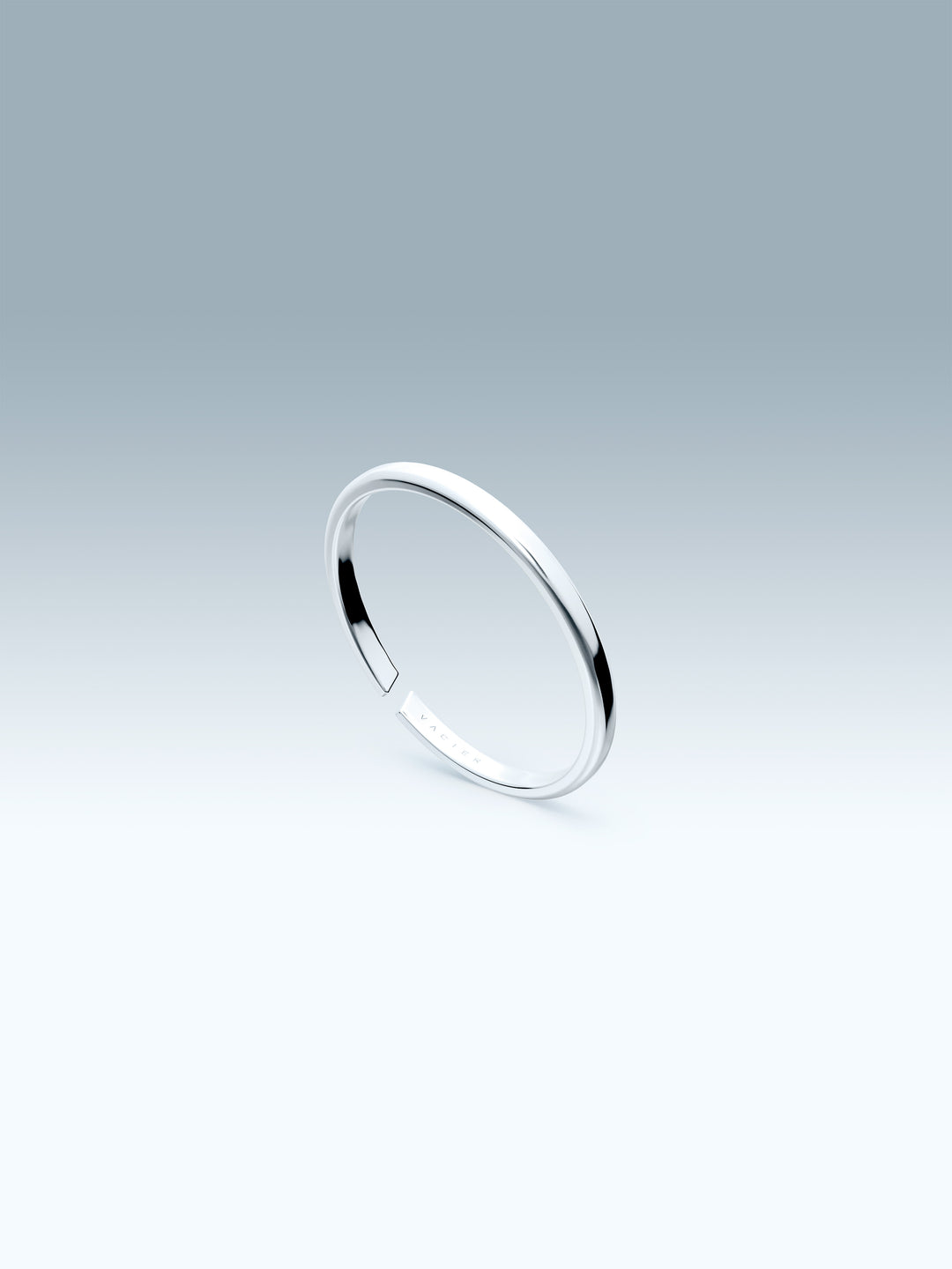 Silver vacier linear ring on a light gray background