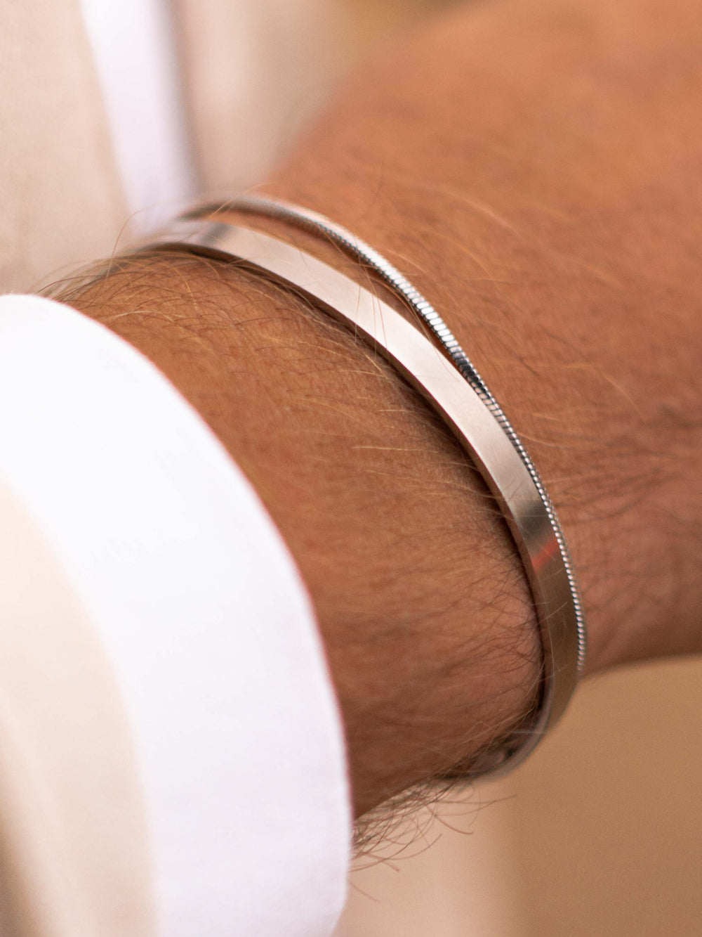 silver unisize cuff on wrist